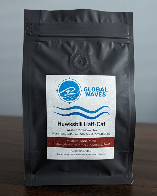 Hawksbill Half-Caf Blend is an amazing blend of 50% decaf and 50% regular coffee - for half the caffeine and all the flavor! Featuring 100% premium Colombian coffee, this delicious roast has highlights of caramel, chocolate, and fruit.