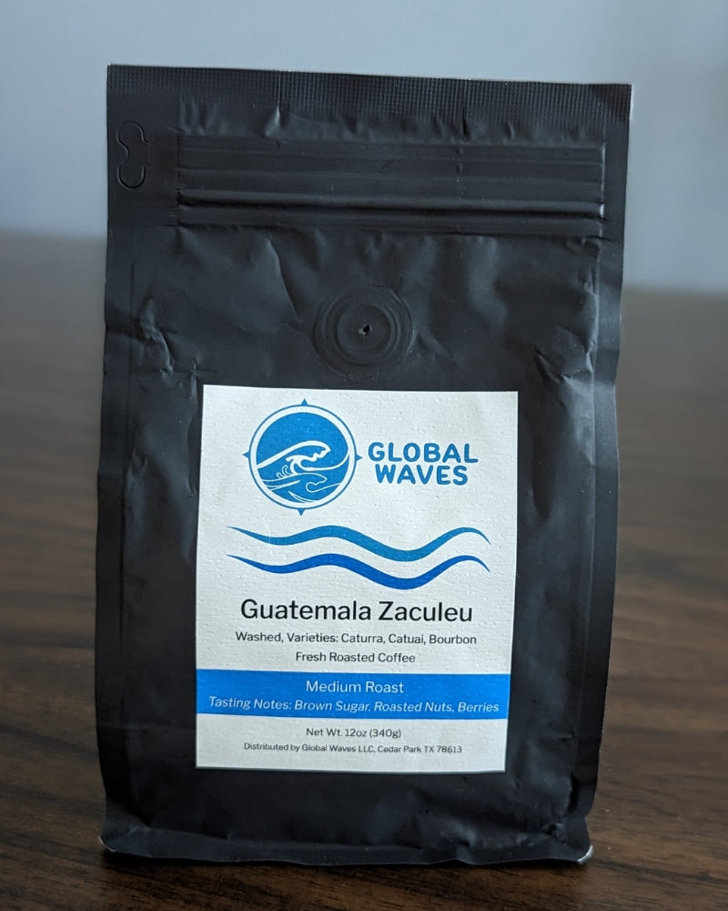 Global Waves is excited to offer this premium medium roast coffee from women-owned farms in the Huehuetenango region of Guatemala. Featuring a blend of varieties (Caturra, Catuai, Bourbon) from three farms, it has tasting notes of brown sugar, roasted nuts, and berries.